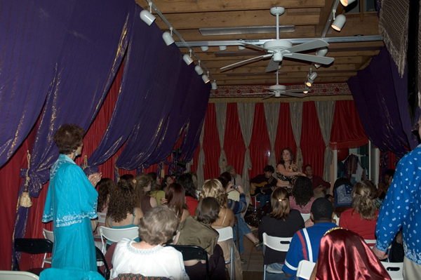 View of the Studio with full stage curtains and seating
